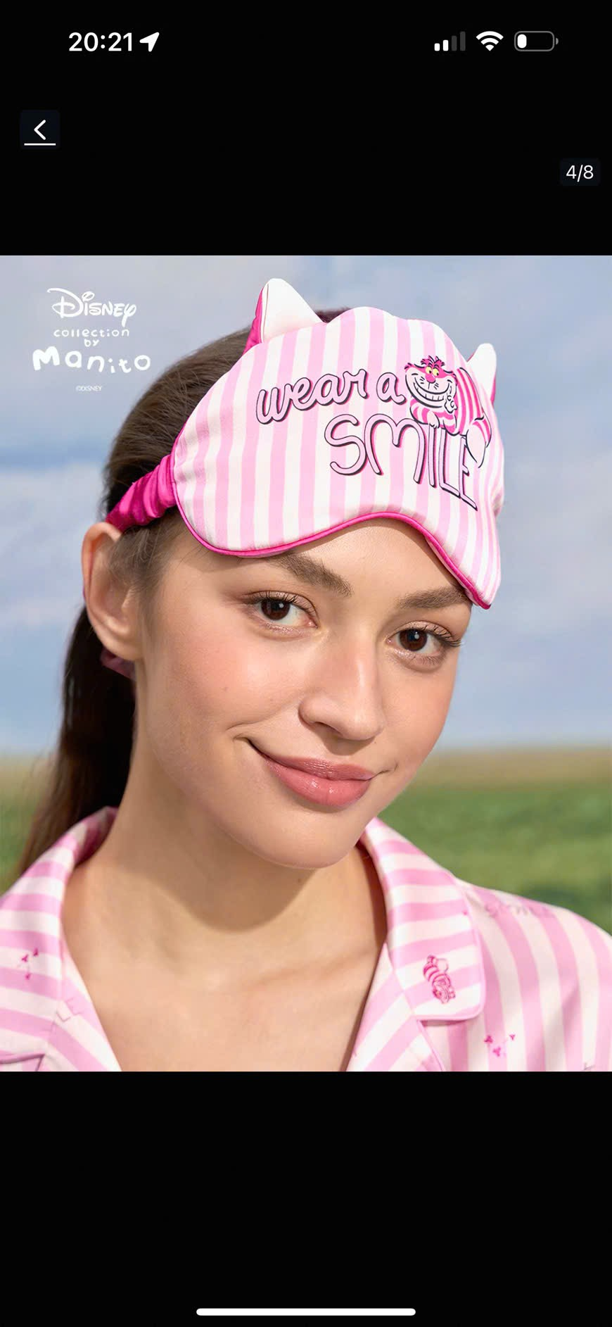 Pink striped sleep mask with licensed character artwork